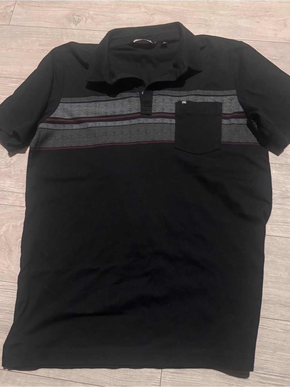 Travis Mathew Black Polo with Gray Chest Stripe and Maroon Accents